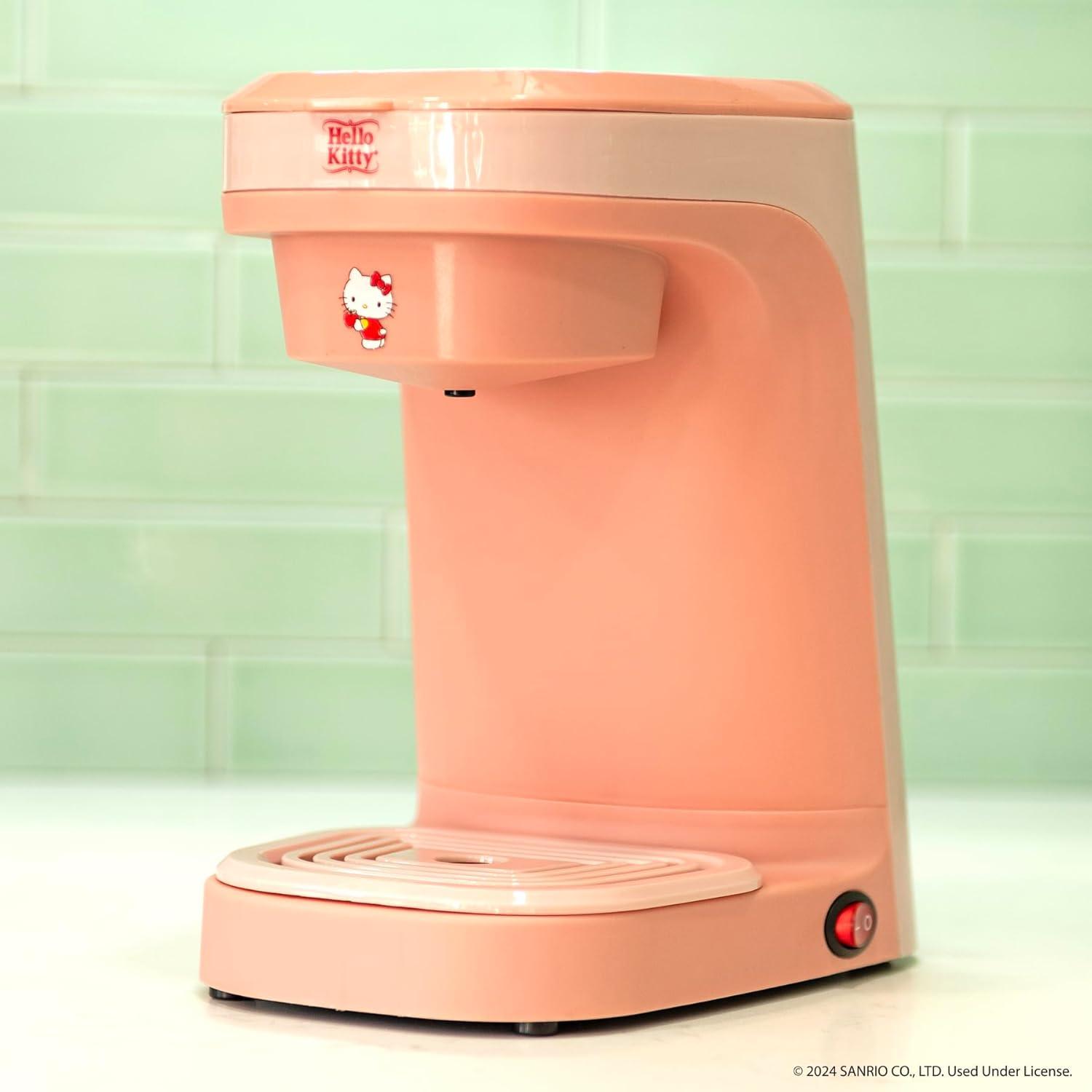 Cafetera de una taza Hello Kitty Uncanny Brands con 2 tazas