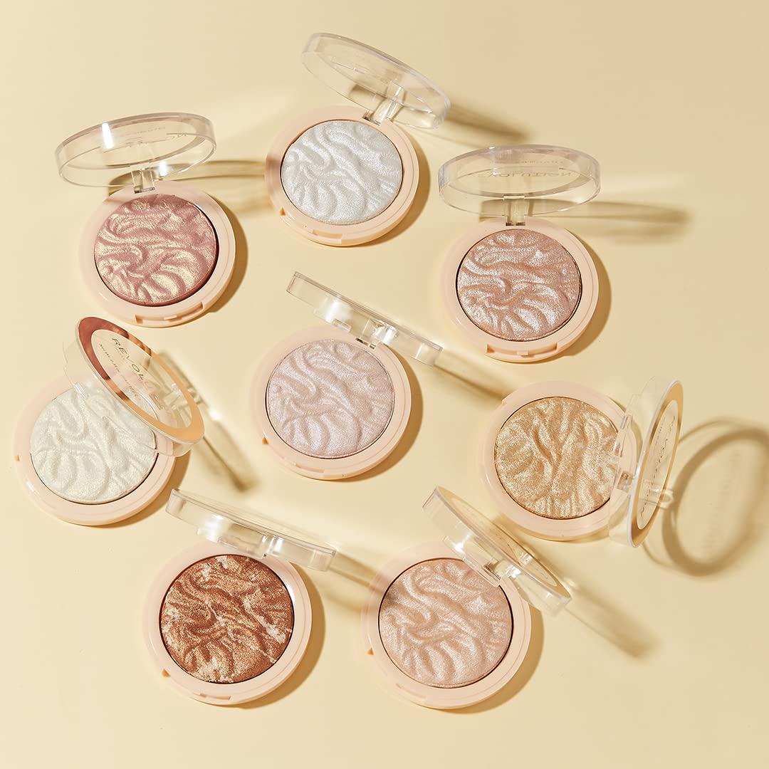 Polvo Iluminador Compacto Revolución 9.92 g Brillo Intenso