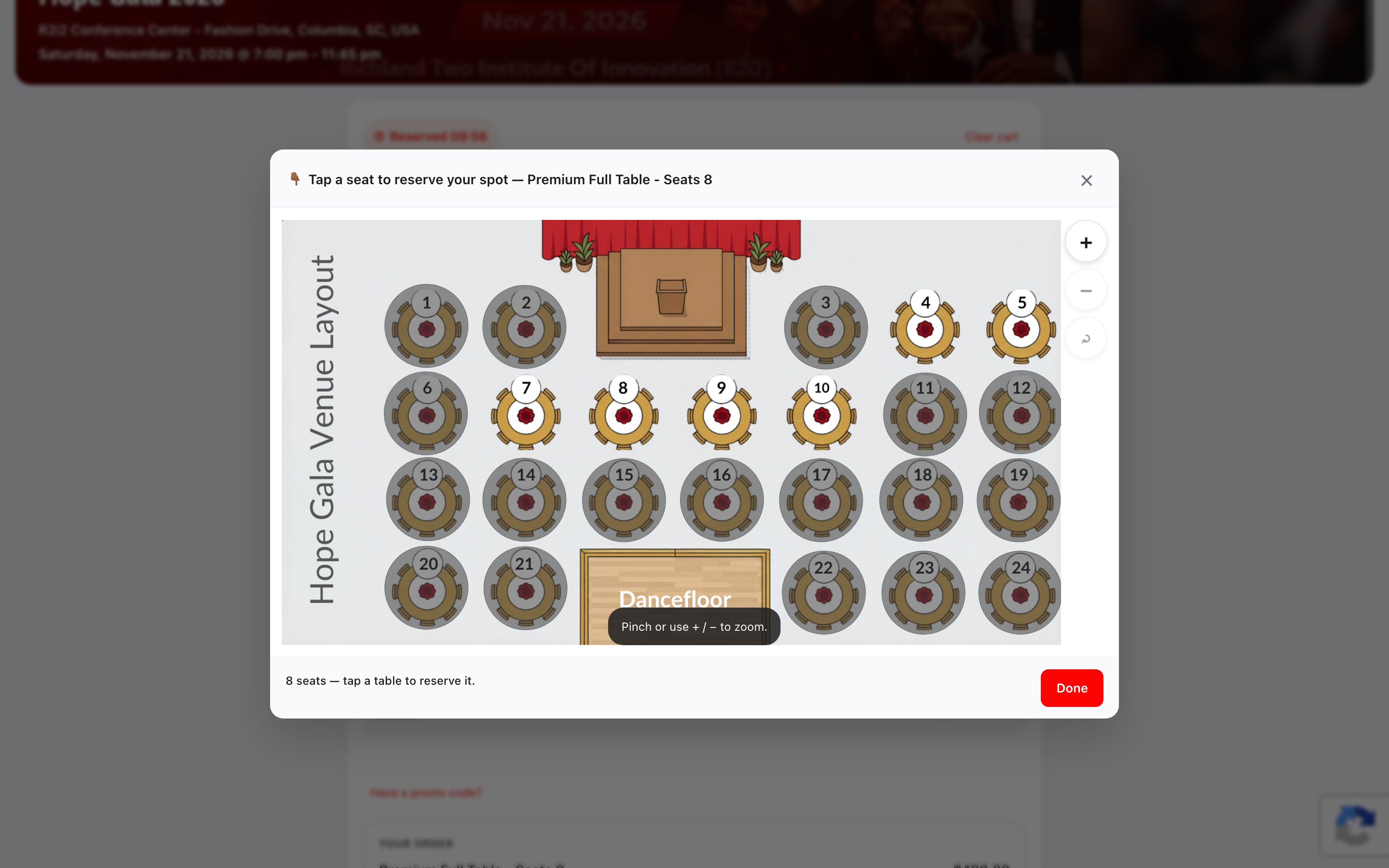 The interactive venue map showing numbered banquet tables, the stage, and the dance floor
