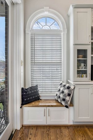 Kitchen bench with storage underneath by a window