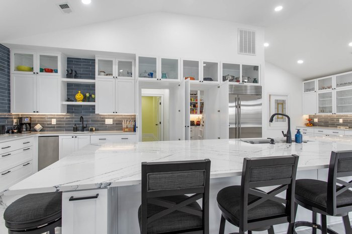 Kitchen with hidden pantry storage