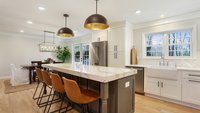 Modern white kitchen remodel with island in Greenville, SC