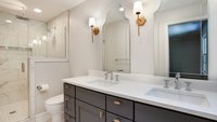 Traditional blue and white primary bathroom remodel