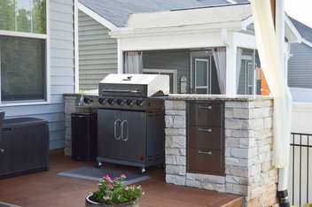 Covered patio with built in grill area