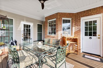 Covered porch on brick house