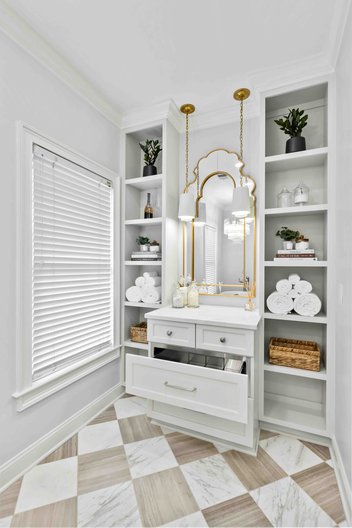 Bathroom remodel with small vanity and warming drawer