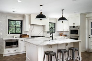 Transitional white kitchen with black accents