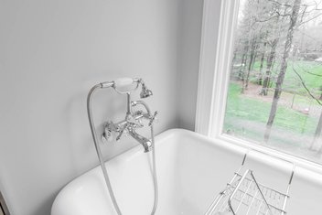 White tub with silver fixtures