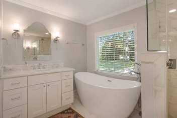 Grand Cayman Freestanding Tub in a traditional white bathroom
