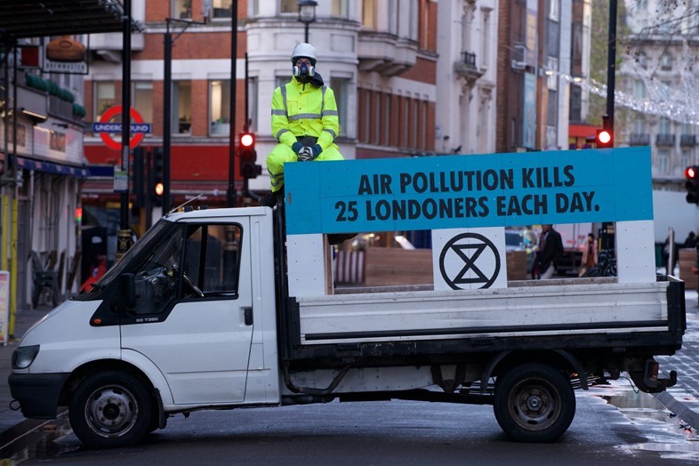 Extinction Rebellion Glue Themselves To London Road In A Fight On Air Pollution