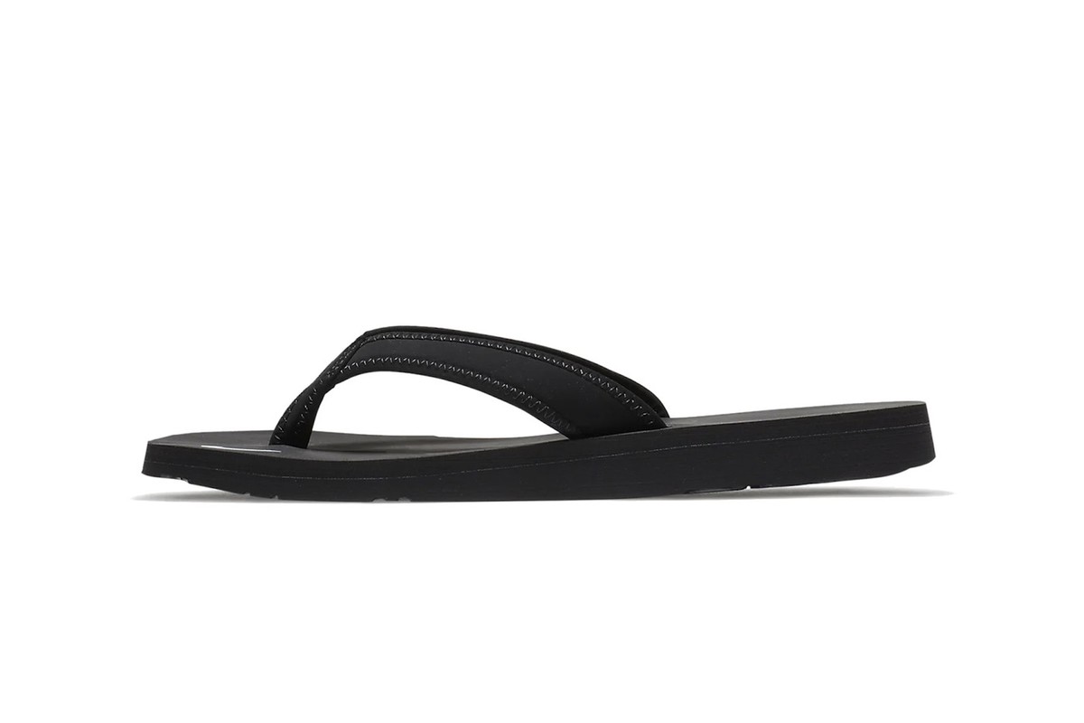 Add A Touch Of ‘90s Fashion To Your Summer Outfits With Nike’s New Logo Flip-Flops 