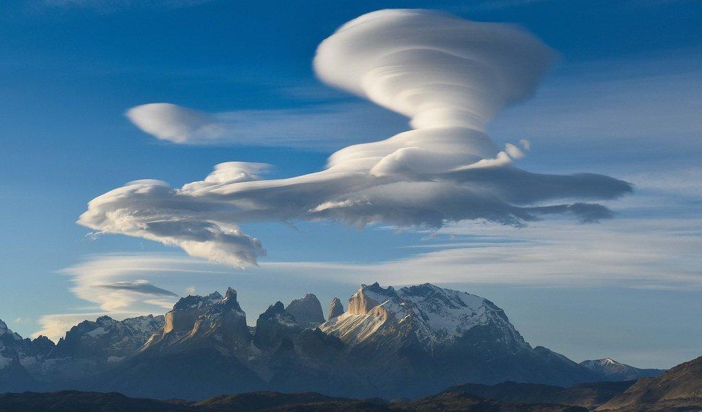 Lenticular clouds stacked over the Cuernos del Paine massif, Torres del Paine National Park, Chile