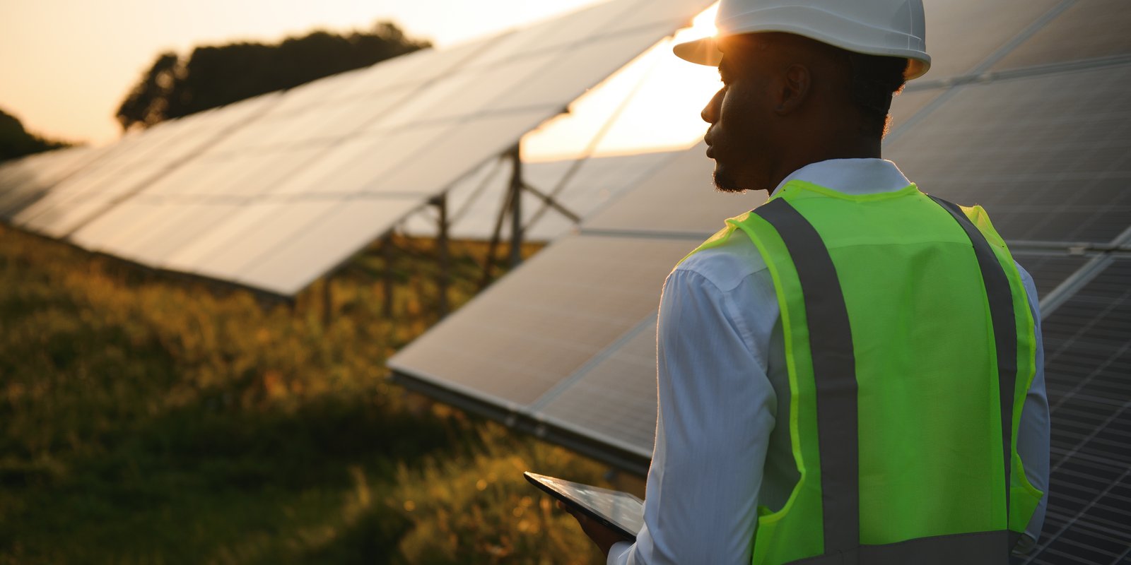 African man working at solar farm