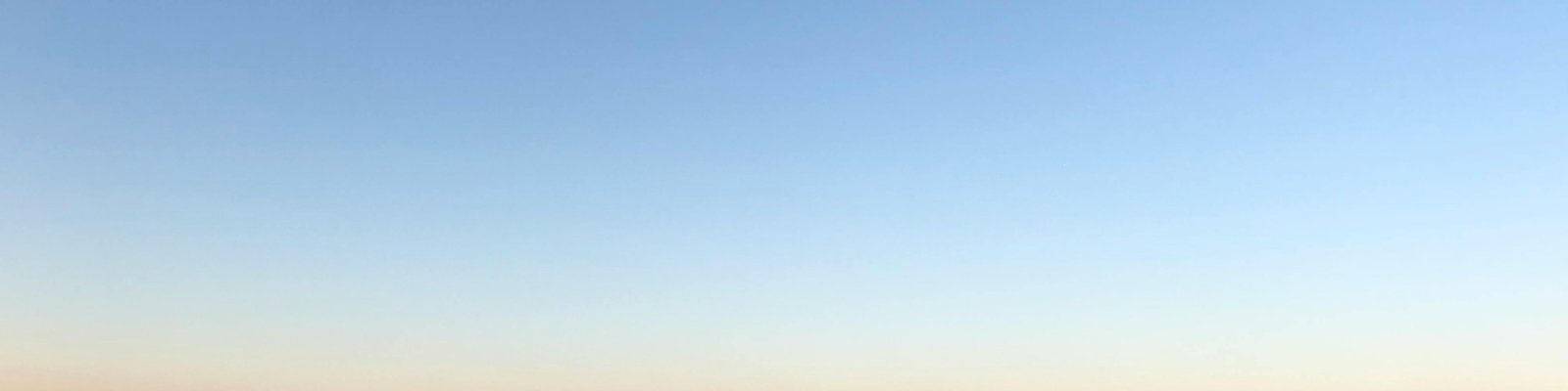 Solar panels, dusk sky