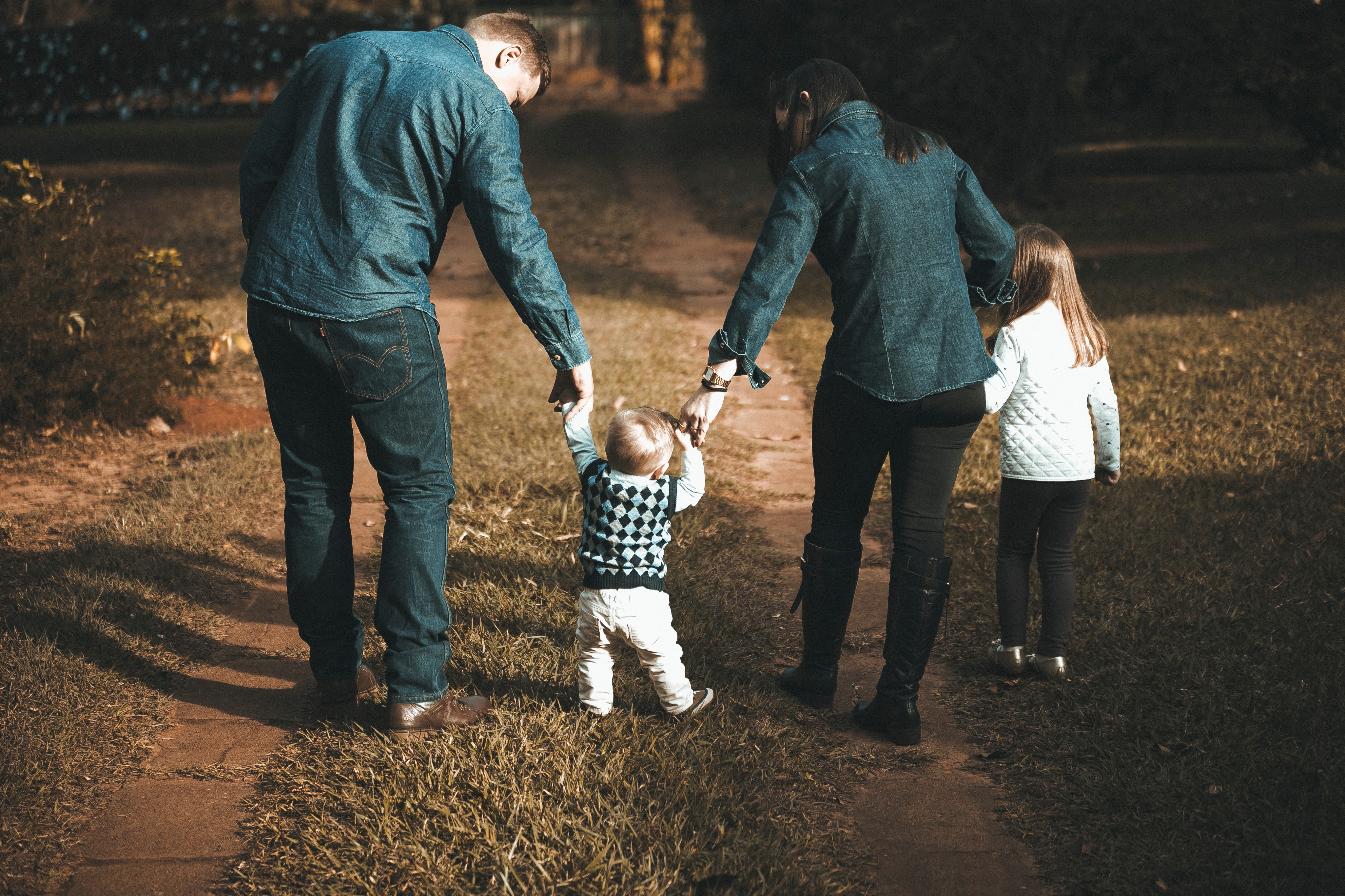 Family walking together on a trail