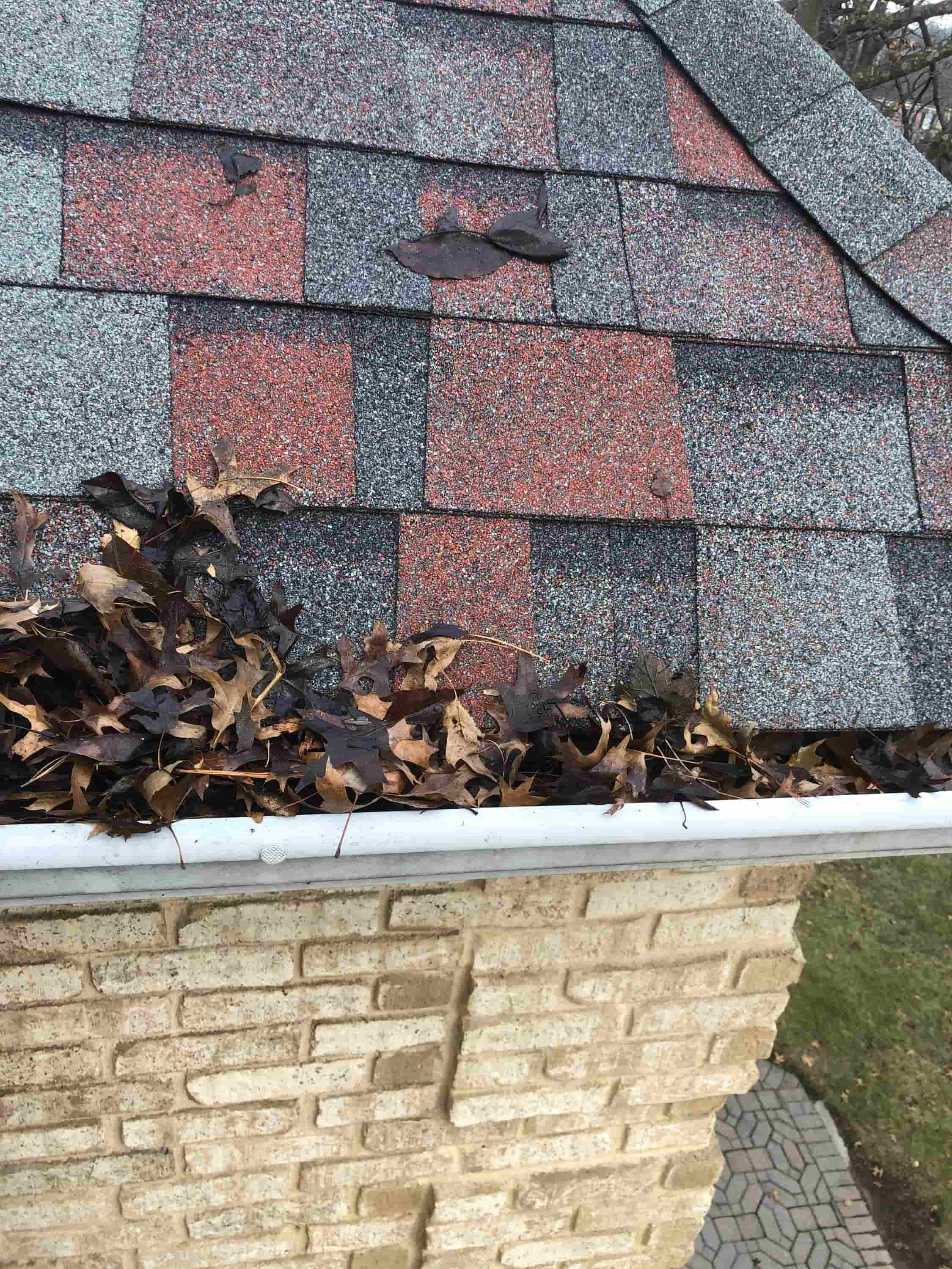 clean gutter with pressure washer