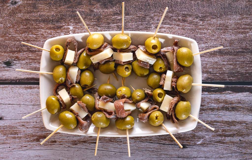 olives with anchovies and Manchego cheese