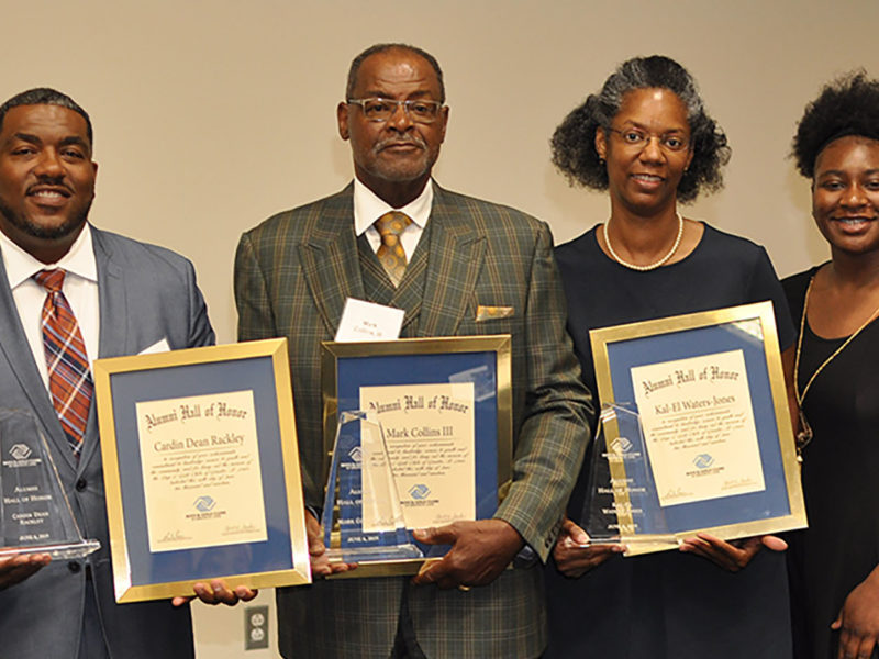 Cardin “Dean” Rackley and other Alumni Hall of Famers holding their Boys & Girls Club awards