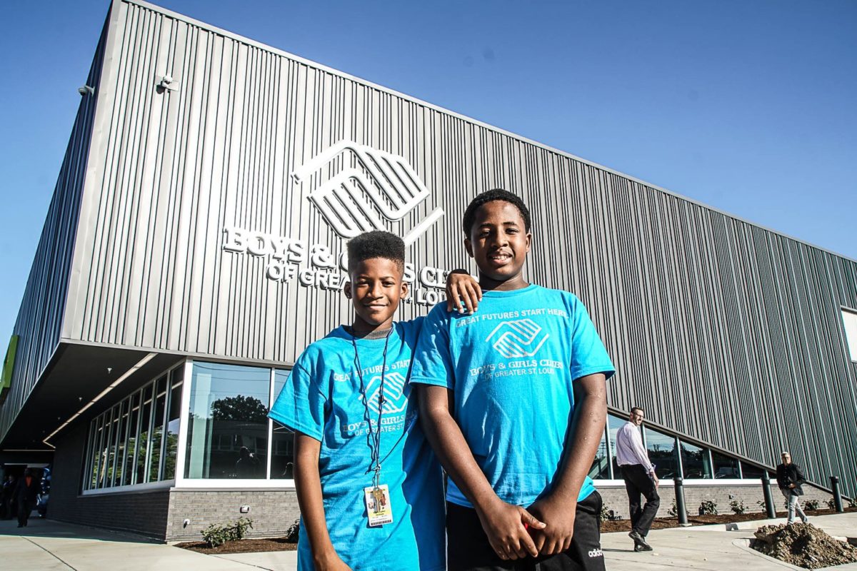 Two boys in front of the Boys & Girls Clubs of Greater St. Louis (BGCSTL) Teen Center of Excellence