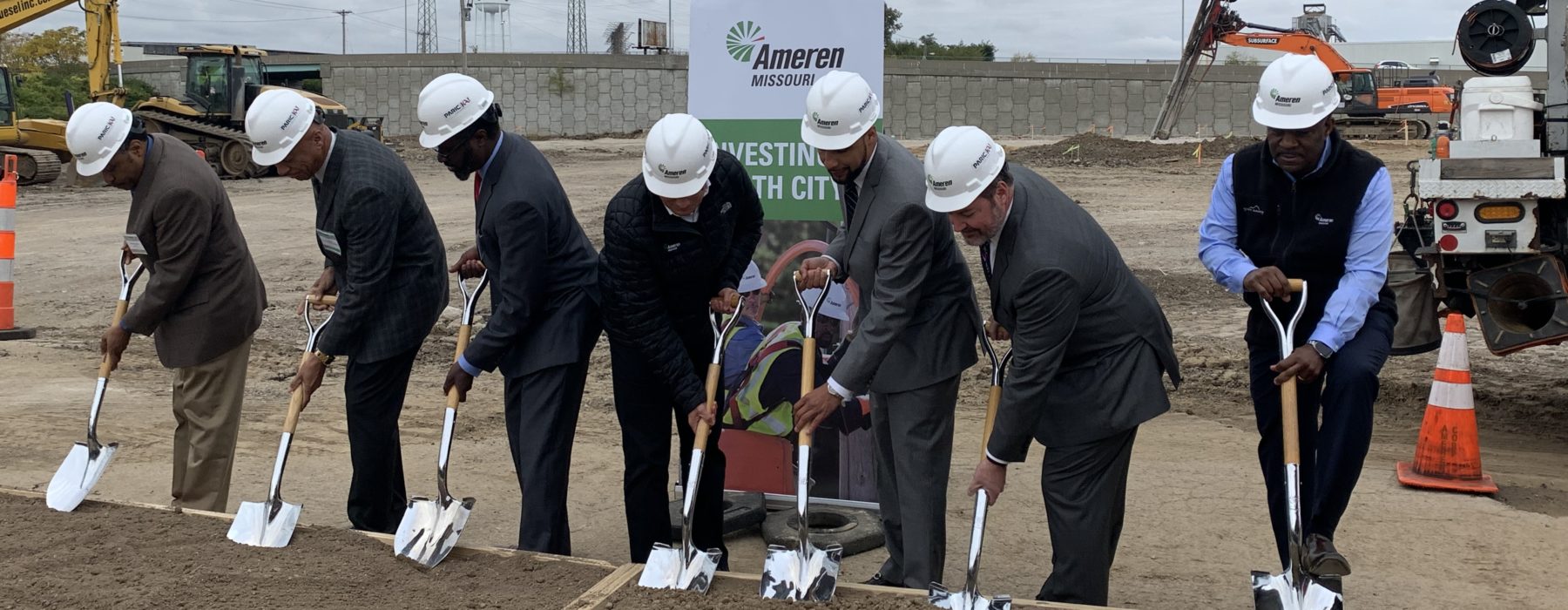 Leaders in KAI/PARIC construction hats shoveling dirt at the Ameren Missouri Operating Center groundbreaking ceremony