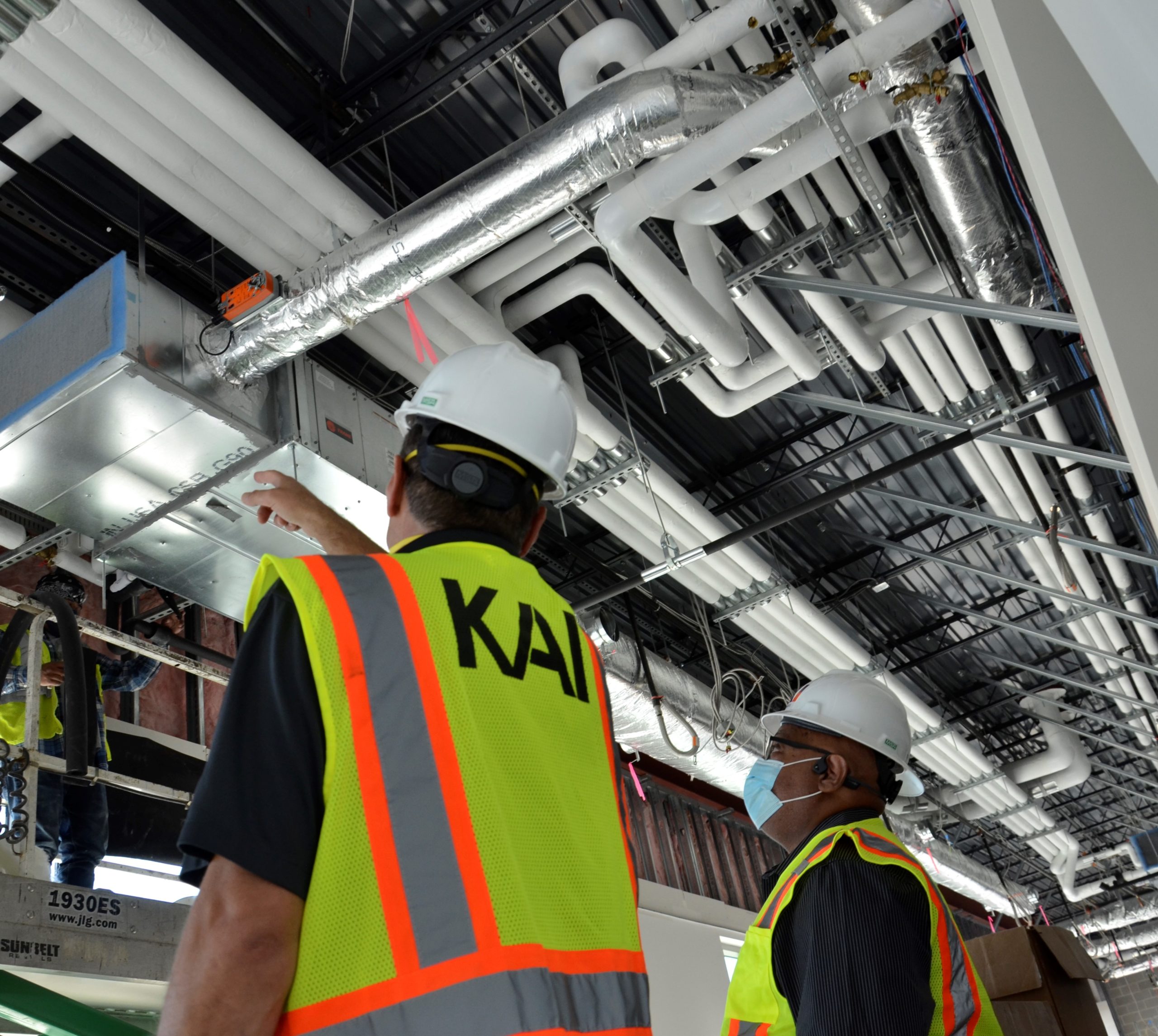 KAI Engineers Working on a HVAC unit
