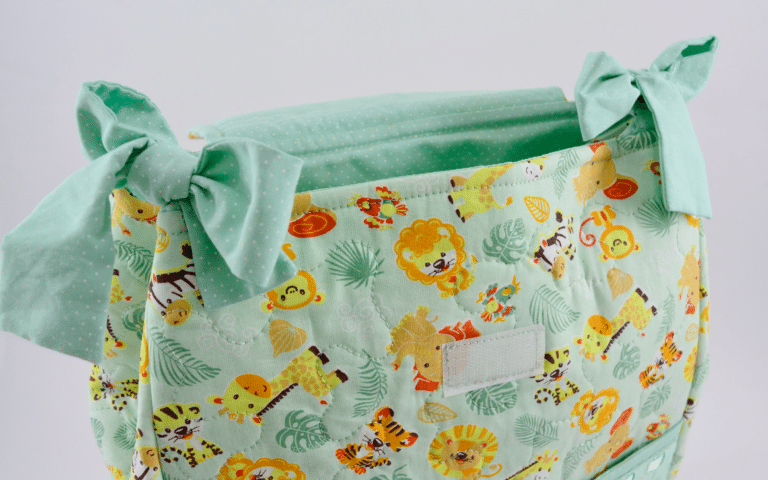 Porta-Fraldas Safári em Patchwork: Organização com Estilo Selvagem