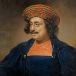 Photo Credit: Rembrandt Peale, 1833. Source: Peabody Essex Museum. Description: Half-portrait oil painting of Ram Mohan Roy, painted by Rembrandt Peale in 1833. Roy and Peale met in London, a few days before Roy's death according to John Quincy Adams. Roy wears a red and gold turban common to early 19th-century Bengali Hindus.
