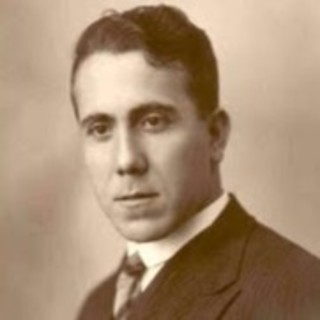 A sepia-toned photo portrait of a young José Medina Echavarría in a suit. Photo Credit: unknown. 