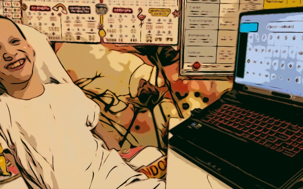 "Ivan, a widely-smiling pale-skinned person with hazelnut eyes, is sitting in his chair covered by a light plush blanket. He sits in front of his desk and laptop which is open and shows a Russian alphabet and a typed phrase “hello cosmos.” A pale grey stripe of the eyetracker is attached between the upper and lower parts of the laptop. Behind Ivan, on the wall, there are a lot of posters with school rules from Math, Russian, and English. The wallpaper peeking through the posters shows beautiful red flowers scratched a little bit at the bottom by cat’s claws."