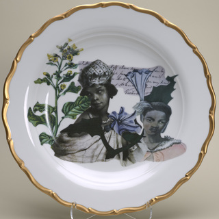 Image of white porcelain plate with gold-rimmed edge, featuring line drawn illustrations of two African women, a plant with green leaves and yellow flowers, and a small piece of paper with cursive handwriting
