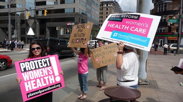 Image from a 2009 rally to protect women’s health