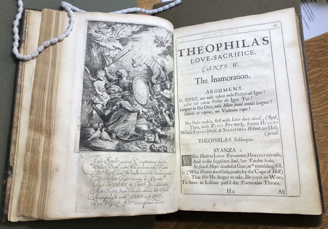 Photograph of a page opening in Benlowes’s gift copy of Theophila to St. John’s College Library.