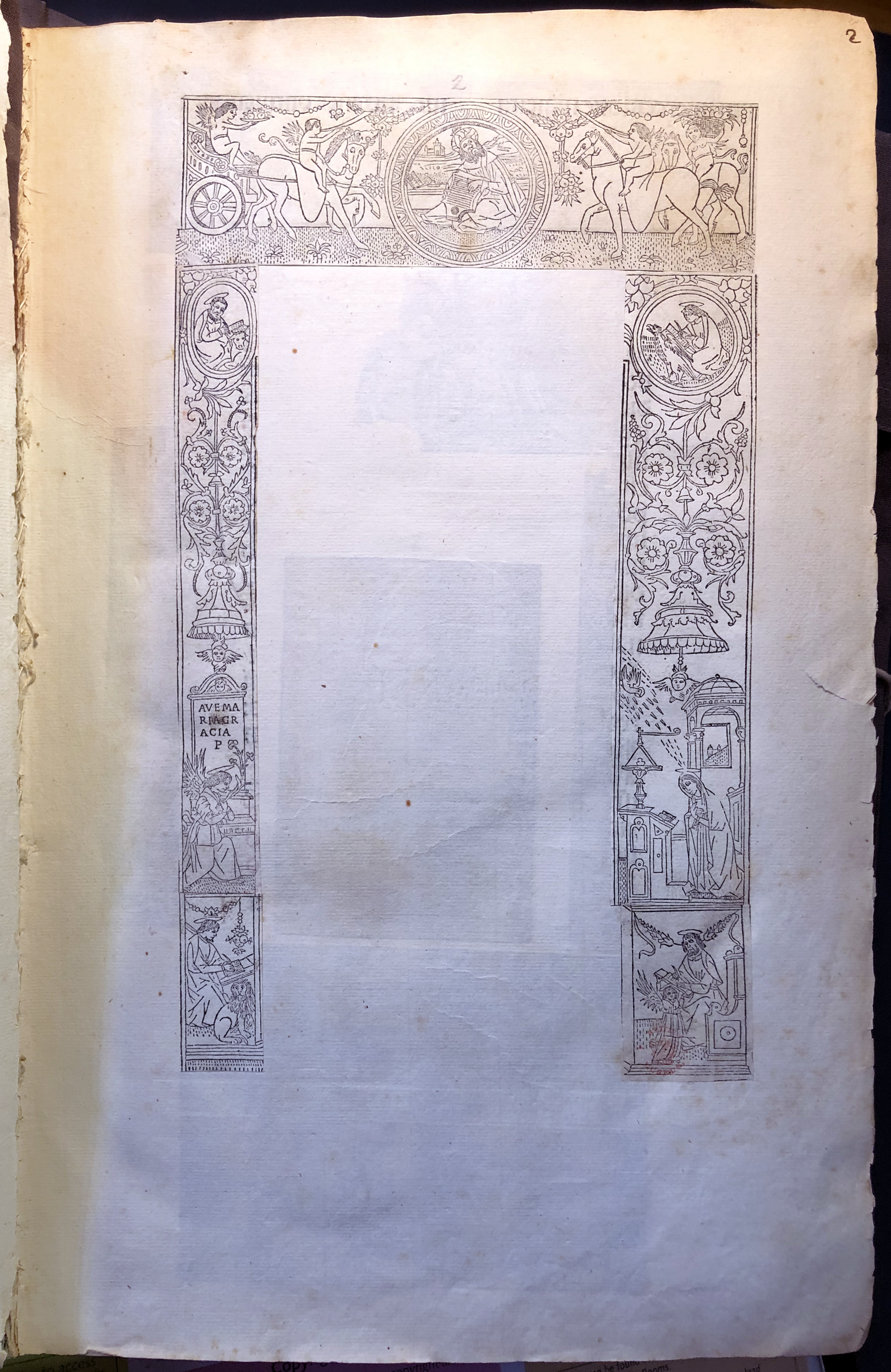Photograph of a decorative printed border pasted into an album assembled by John Bagford