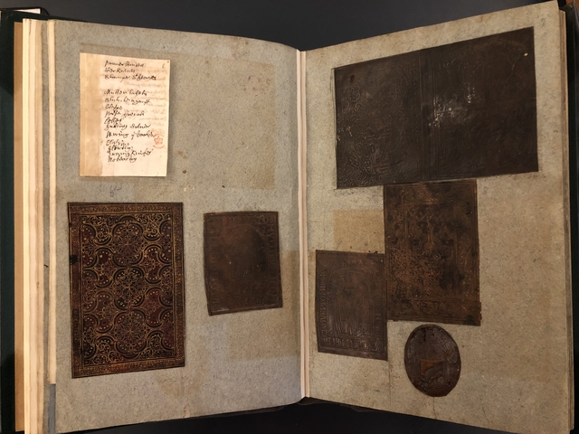 Photograph of binding specimens pasted in an album assembled by John Bagford