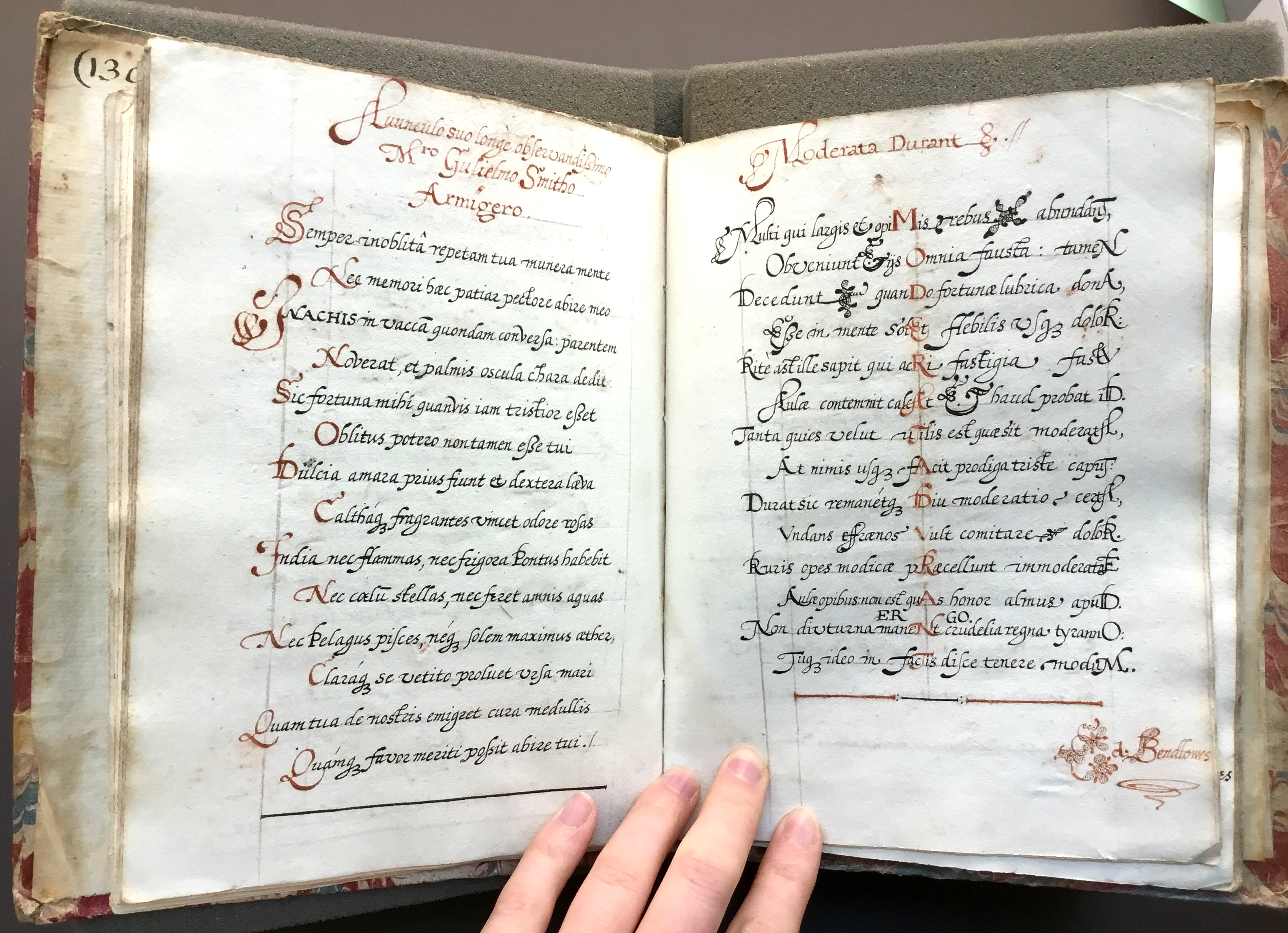 A Latin poem neatly copied in Edward Benlowes’s youthful hand, with a florid signature and initials in red.