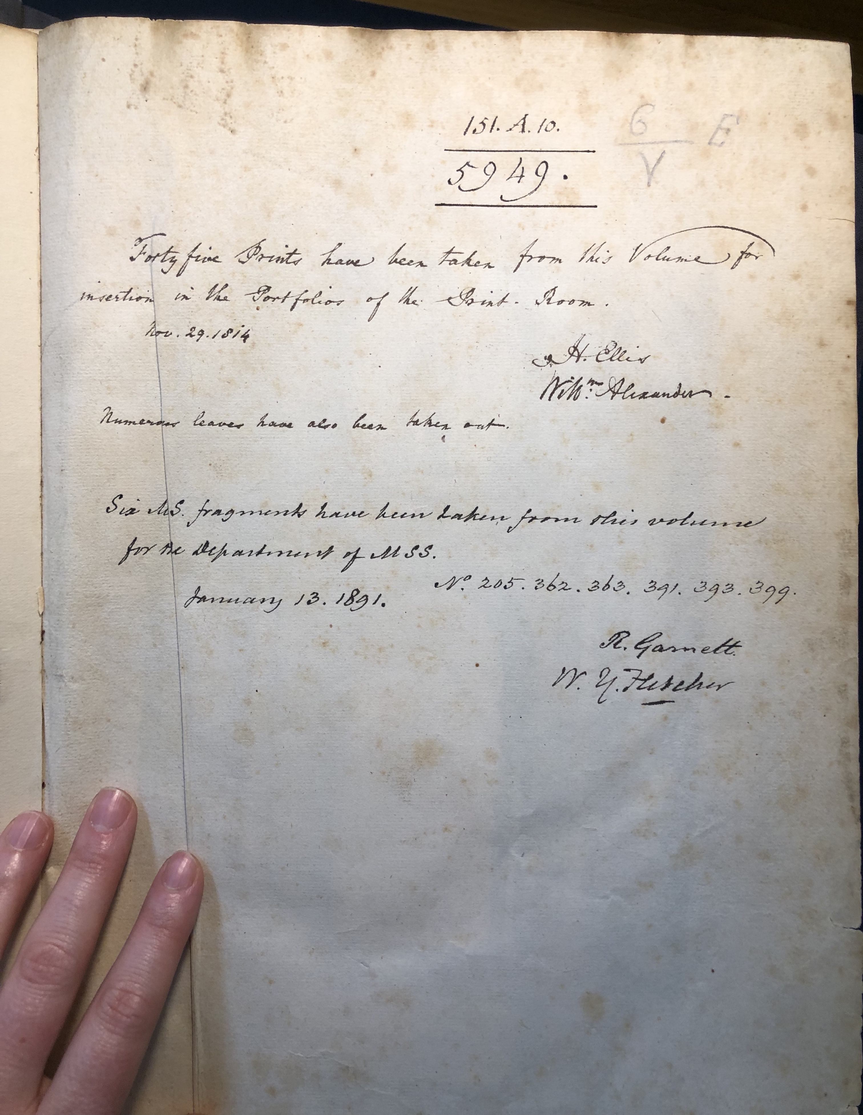 Photograph of the flyleaf in one of John Bagford's assembled albums of scraps showing layered shelfmarks