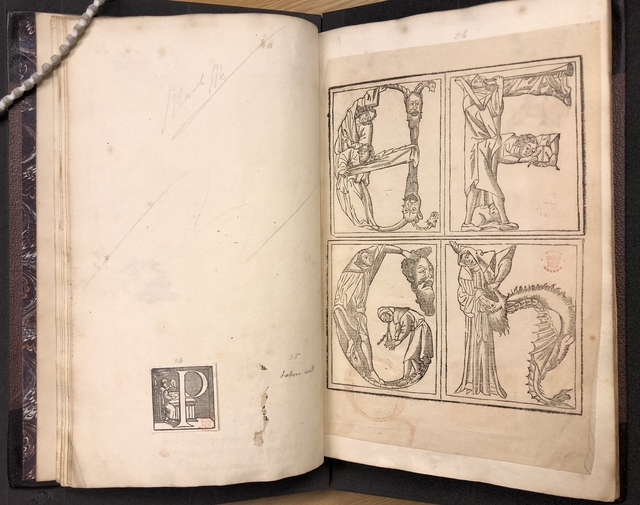 Photograph of specimens of decorative intials pasted in one of John Bagford's albums of scraps