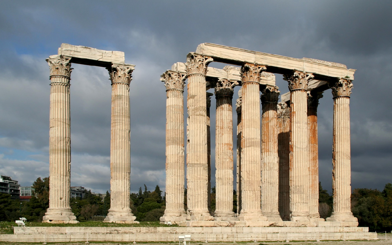 This photograph shows the few remaining Corinthian columns of the Temple of Olympian Zeus at Athens.