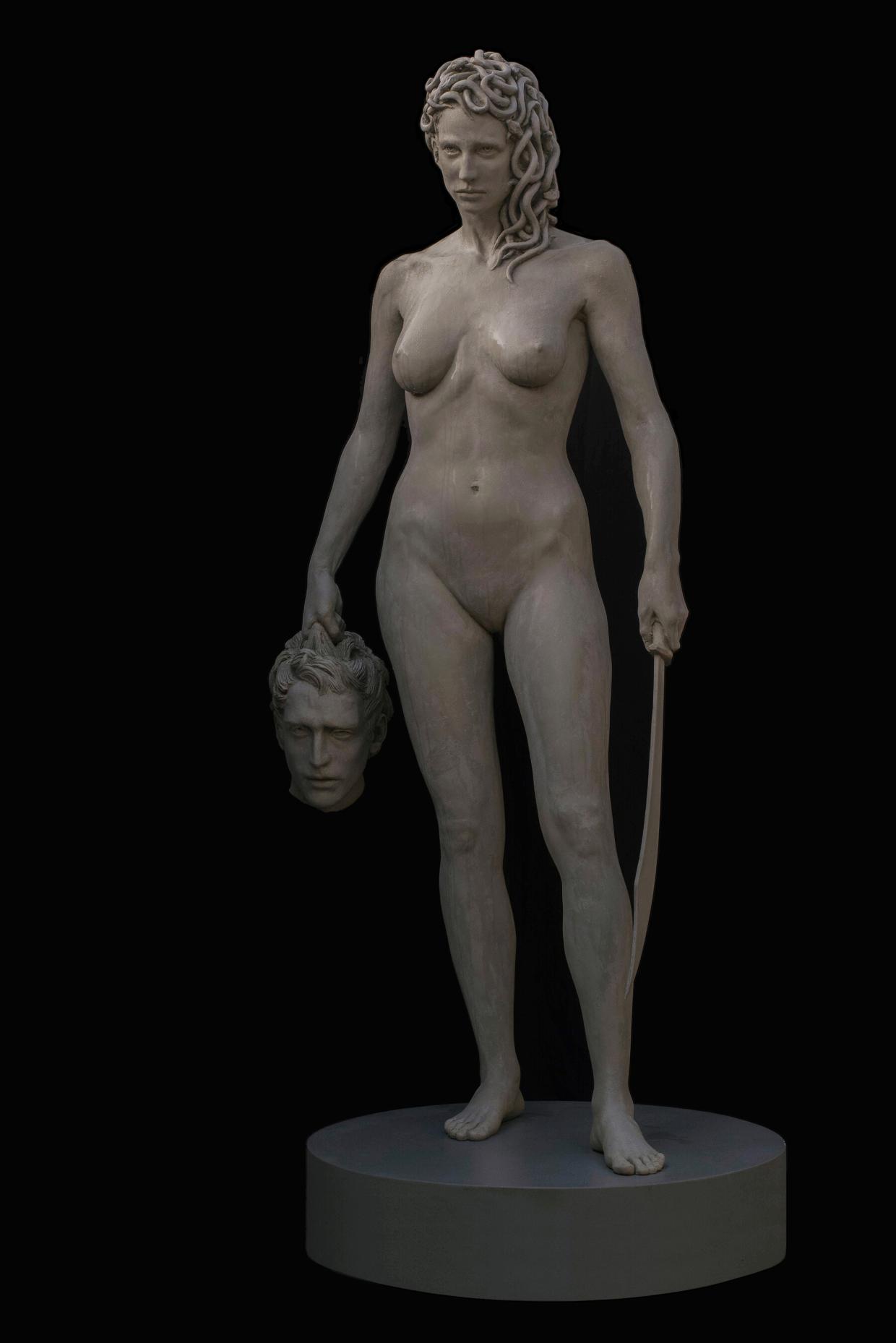 The statue depicts Medusa holding a sword and the head of Perseus