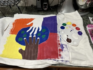 "Helping Hands" Art Painting on Fabric By Roland Hairston