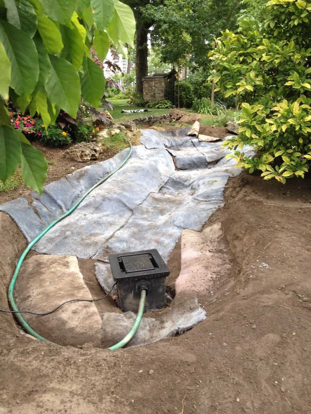 A narrow, shallow trench was dug before pounding the bricks into place. My section wasn’t dead straight, but Boni can adjust the bricks if they look too crooked.