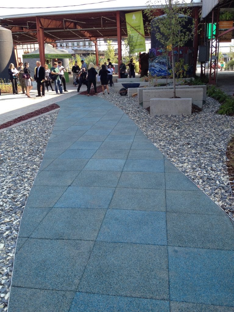 The blue-green path resembling a river at the newly designed site at Evergreen Brick Works.