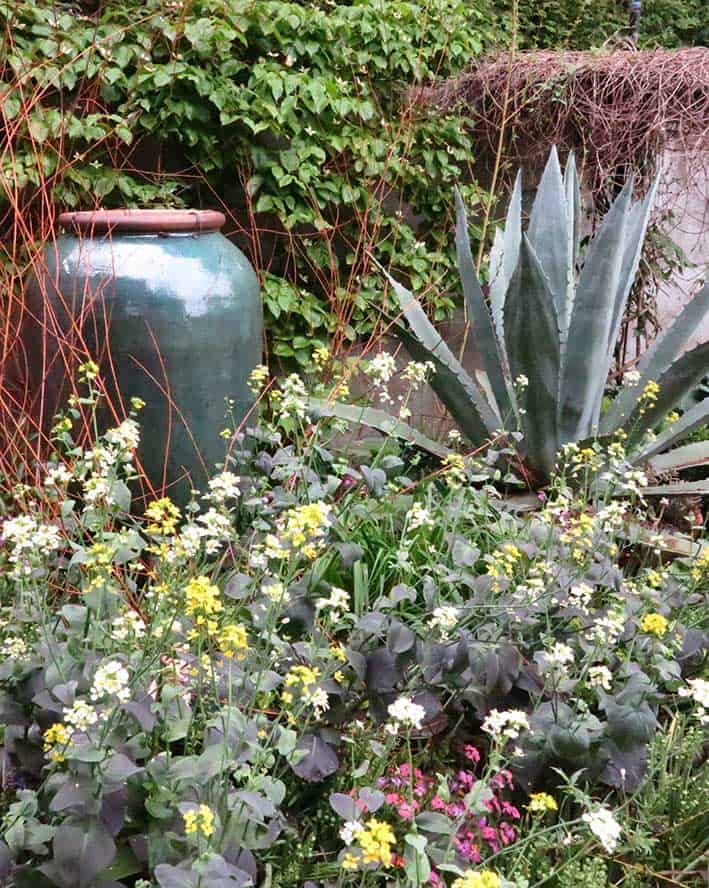 There’s eye candy for plant lovers everywhere you turn at Chanticleer Garden in Wayne, Pennsylvania. I love how the containers, foliage, branches and blooms all work together to create intimate vignettes. (Garden Making photo)