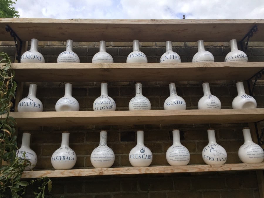 A section of a 36-porcelain jar collection by ceramic artist Nici Ruggiero. She based her design on apothecary jars that would have been used by early pharmacists.