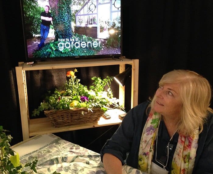 Liza Drozdov of Hortus TV at garden show explaining the new service.