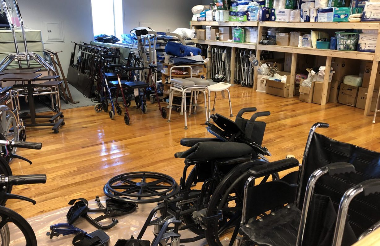 Wheelchairs and other medical equipment stored in a room