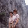 Two women standing in front of a cliff