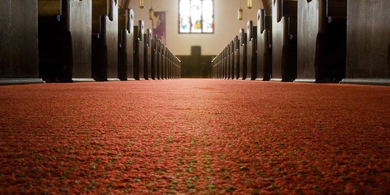 commercial cleaned church floor between pews