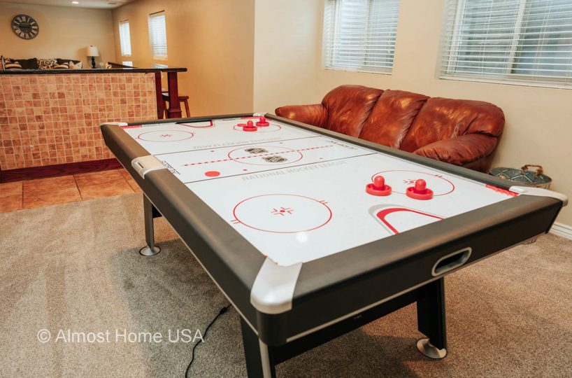 Air hockey table in furnished home located in Sandy, Utah.