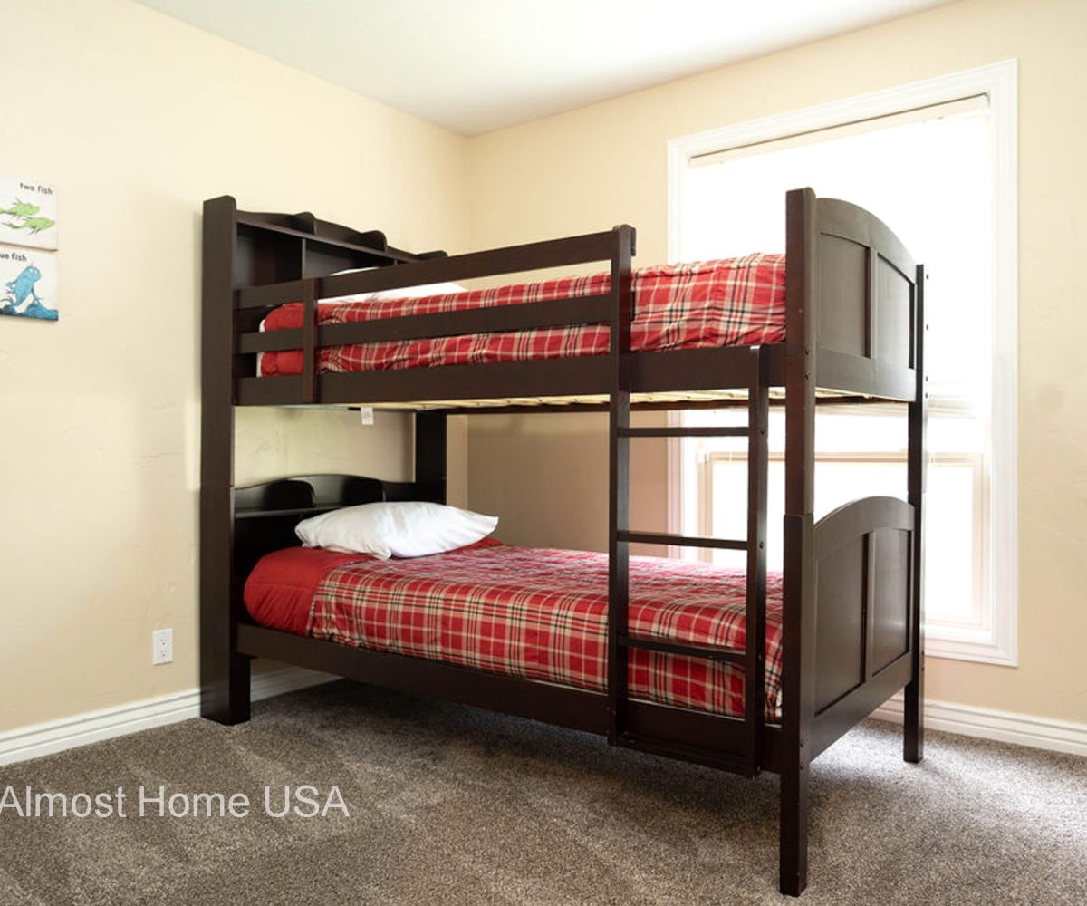 Single bunk bed in bedroom in furnished home located in Sandy Utah.